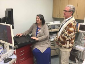 Dr. Lou Ann Eads and Dr. Jeff Clothier review a patient’s file in the UAMS Psychiatric Research Institute’s ECT suite